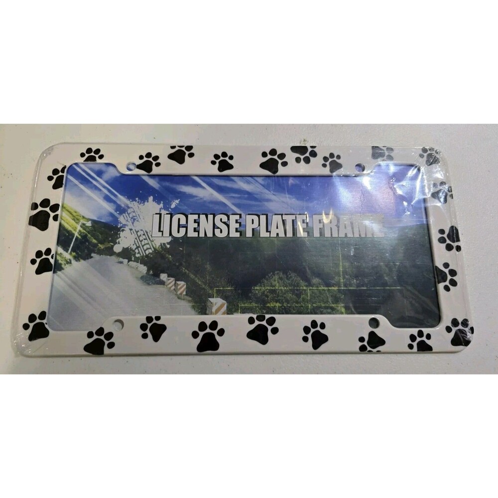 NWOT Sealed Paw Print License Plate Holder Frame White With Black Prints